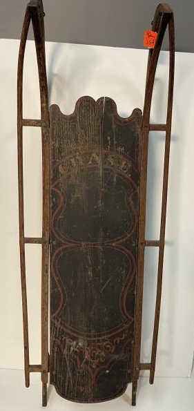 Sled, Double Runner Painted & decorated"Chase": Painted & decorated"Chase" stenciled on top, Top of seat paint worn off & paint worn throughout, Frame structurally sound, 11 1/2" tall x 62 1/2 x 21" wide