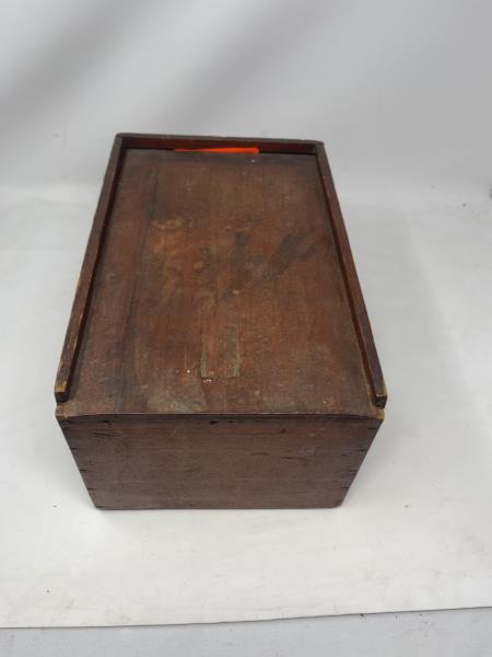 Candle Box, Painted red with sliding top Top cracked &: Top cracked & repaired, sider cracked & repaired, single finger notch on lid, 7" tall x 12" x 8"