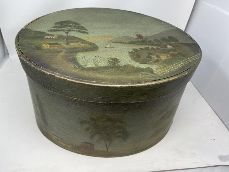 Scenic Box, painted green, oval, lake scene with Very: Very Good Condition over all with some minor scrapes & flakes, 10" tall x 14 3/4 x 17" top