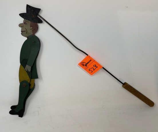 Dancing Man Painted tin double sided on wooden/metal: Painted tin double sided on wooden/metal handle, jointed body, paint scratched, figure 11" x 2" with 16" handle