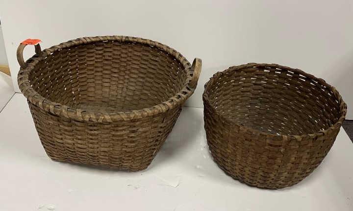 Splint Baskets Lot of two, handle basket 12" tall x 22": Lot of two, handle basket 12" tall x 22" wide; open basket 9 1/2" tall x 16" wide; some damage on each