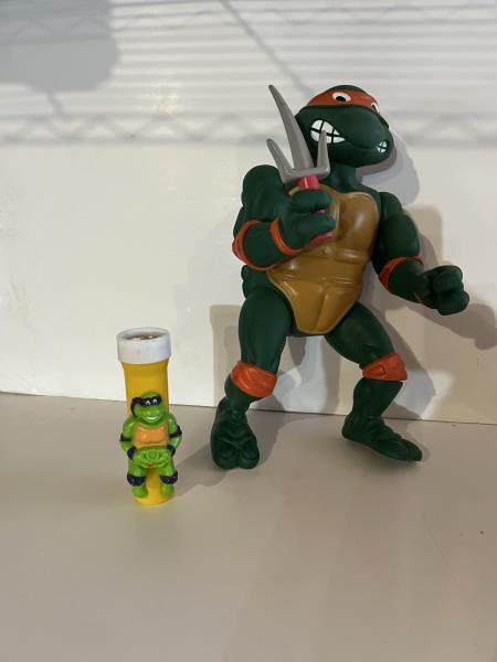 Teenage Mutant Ninja Turtle Auction Figure of: Teenage Mutant Ninja Turtle Auction Figure of Michelangelo, 1989, 14" Tall; Flashlight