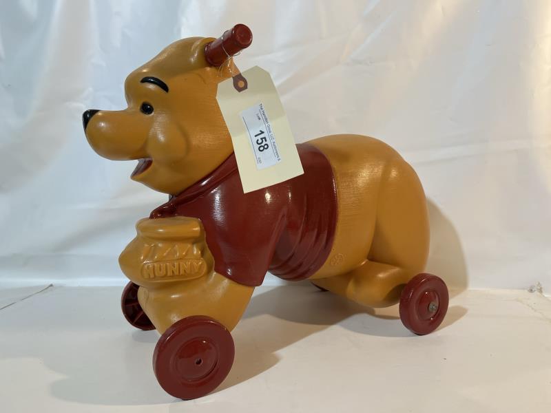 Winnie The Pooh Plastic Rolling Scooter by Louis (1 of 10)