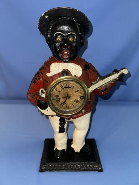 Mantle clock, man playing banjo, The brass clock h (1 of 12)