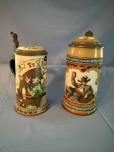 2 Mettlach Steins (1) Women and Tavern Beer Stein: 2 Mettlach Steins - (1) Women and Tavern Beer Stein #2090, 1/2 liter, design by Heinrich Schlitt, 8.5" tall to top of finial. (2) Single Man with raised Stein #2050, 1/2 liter, 9" tall