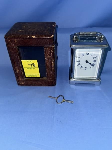 Chrome Carriage Clock with velvet lined case: Chrome Carriage Clock with velvet lined case, R & C made in France, with key, glass good, some chrome worn, 4.5" tall