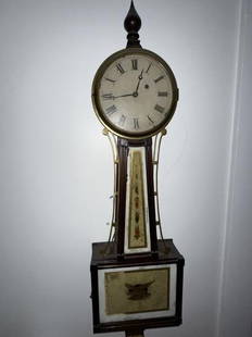 Banjo Clock, reverse painting of eagle: Banjo Clock, reverse painting of eagle on lower door, some damage to paint and door, brass to sides, wt. & pendulum, tin dial, lower section of clock repainted, 38" tall