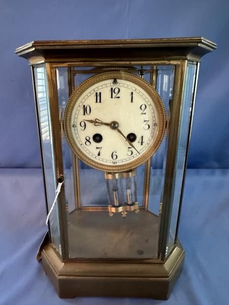 Crystal Regulator Clock, brass & beveled glass: Crystal Regulator Clock, brass & beveled glass, octagonal case, works, stamped Made in France, one crystal window, cracked, pendulum, 12"Tx8.5"Wx6"D