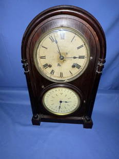 Figural Eight Calendar Clock, rosewood case, dial: Figural Eight Calendar Clock, rosewood case, dial in poor condition, paper label water stained, Burrell & Carter Bristol Conn., some veneer damage, 3/4 turned columns, 17.5"Tx10.5"Wx4"D