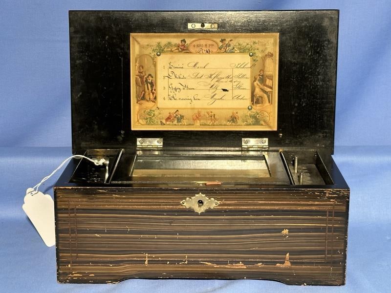 Music Box, decorated box with damaged to finish: Music Box, decorated box with damaged to finish, 4 tune music box, one tooth broken, currently not working, 5"Tx11.5"Wx6"D