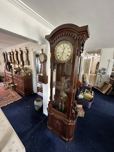 Grandfather Clock, Victorian, Walnut case, brass: Grandfather Clock, Victorian, Walnut case, brass pendulum, brass can weights, metal dial, clock front door and glass side windows, key, case has minor scratching, 7'Tx27"Wx12"D