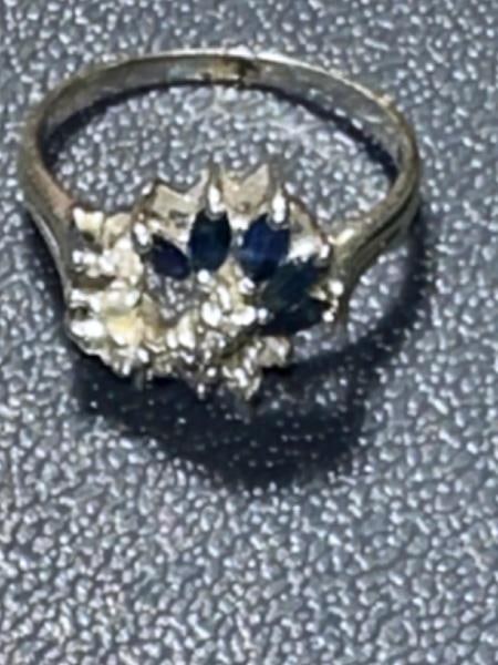 Flower burst 14K White Gold with blue stone: Flower burst 14K White Gold with blue stone and small glass stoneUnless You Are A Liveauctioneers Premium Bidder This Lot Must Be Paid For By Cash, Bank Check or Wire Transfer.