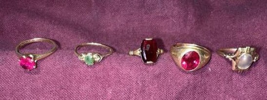 4- 10K Gold Rings - 2 red stones, moon stone, gree (1 of 2)