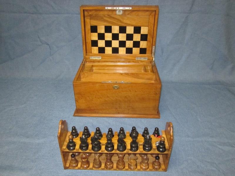 Chess Set, Tiffany & Co. Union Square, Olive Wood: Chess Set, Tiffany & Co. Union Square, Olive Wood Ebony, 9" x 13" x 9", Small Chip Right Front, Minuet Damage Inside Missing 1 Tray