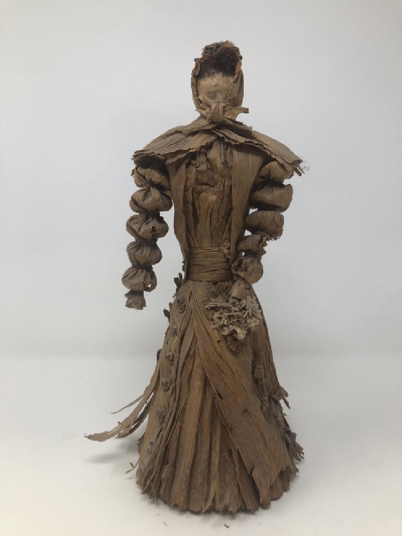 Antique Corn Husk Doll: Measures roughly 11 inches tall.