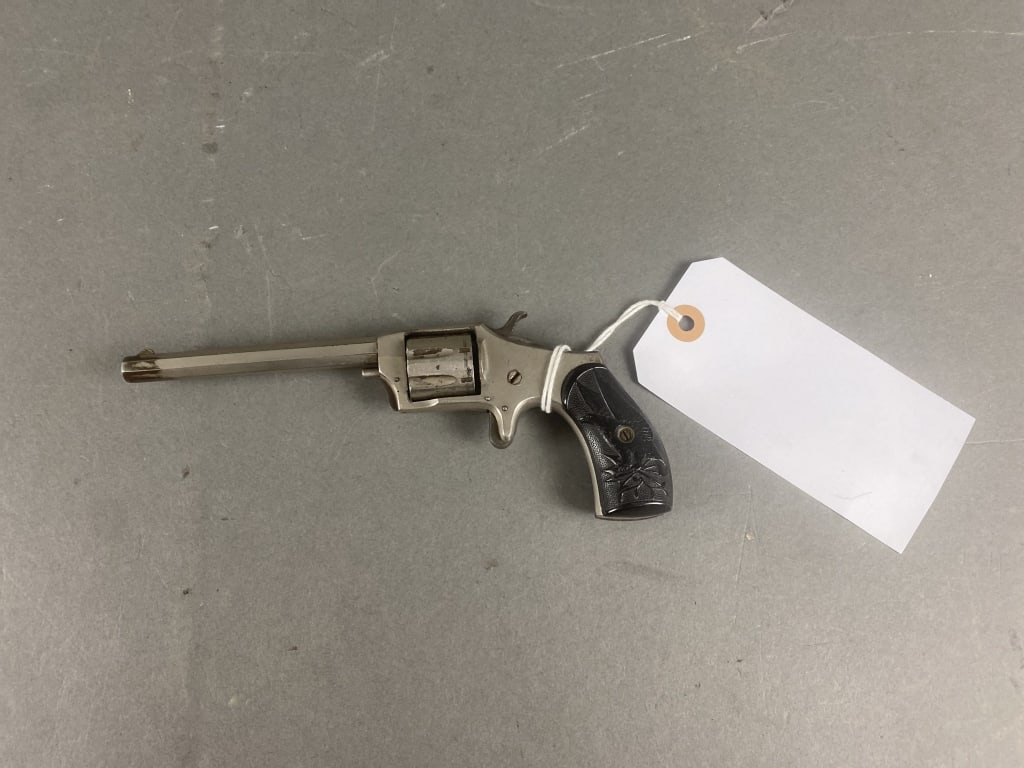 Spur Trigger Revolver: No serial number, 4"bbl , 7 shot , circa 1880's , dark bore , evident rifling , Gutta Percha, grips -patriotic , functions