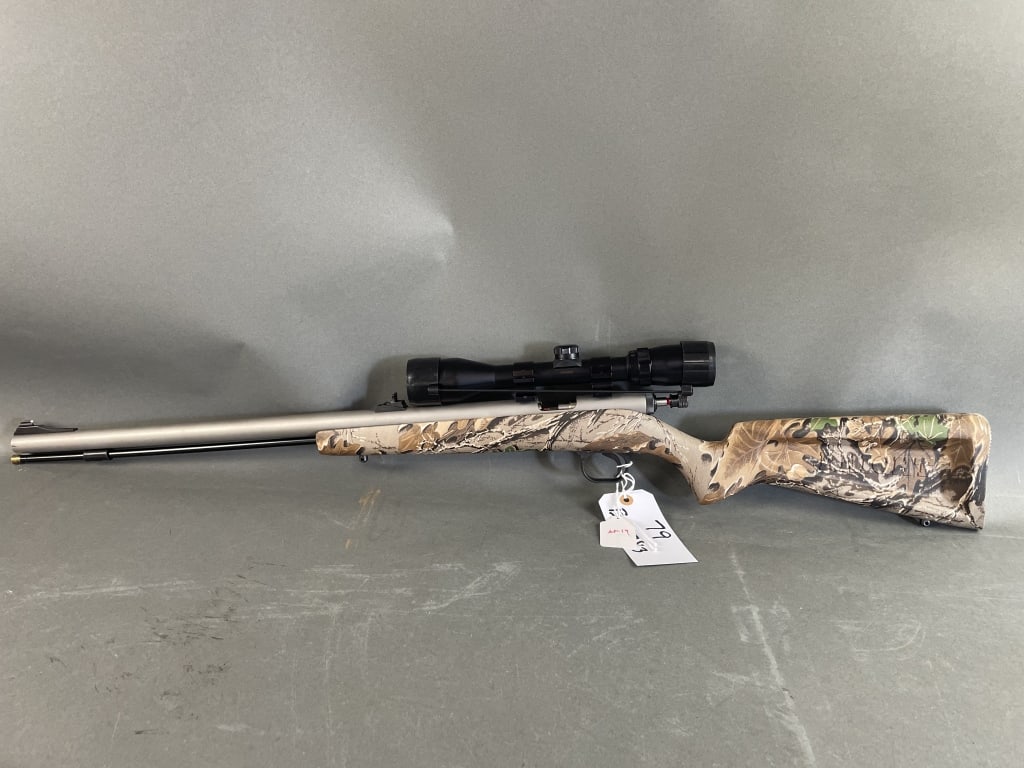 Knight LK-93 Muzzleloader: Camo 100% finish. Excellent condition. Plastic stock-camo finish. 23" barrel. Stainless barrel. Bushnell 3x9. Banner scope. Serial number- S105490
