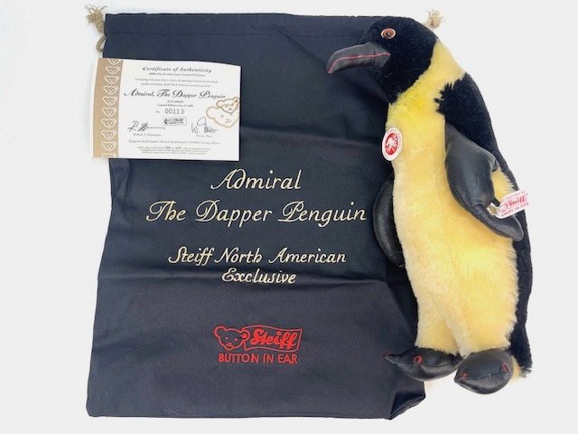 STEIFF 668524 Limited Edition 2006 Admiral the Dapper Penguin 12.5" COA Bag: STEIFF #668524 Limited Edition 2006 ADMIRAL THE DAPPER PENGUIN. Limited Edition of 1,500 this is #113 of 1,500. Measures 12.5" Tall. Comes with a Certificate of Authenticity and original bag.