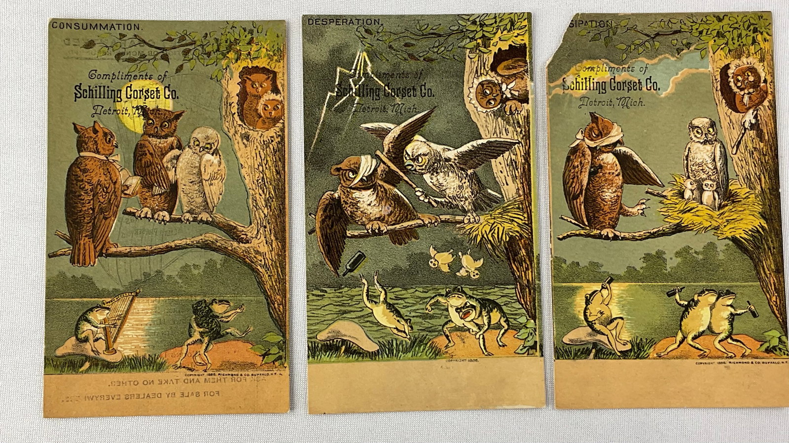 (3) Antique SCHILLING CORSET Co. Detroit MI Advertising cards: (3) Antique SCHILLING CORSET Co. Detroit MI Advertising cards. (1) card is CONSUMMATION and have (5) Owls and (3) frogs (1) card is DISSIPATION and has Daddy Owl with a bandage around his eye, mommy a