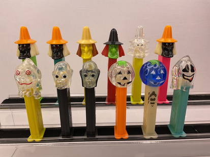 (12) Halloween Pez Dispensers (7) with Crystal Heads Footed: (12) Halloween Pez Dispensers (7) with Crystal Heads Footed. Made in (6) Slovenia (3) Hungary (1) Austria (2) unmarked with country of manufacturer.