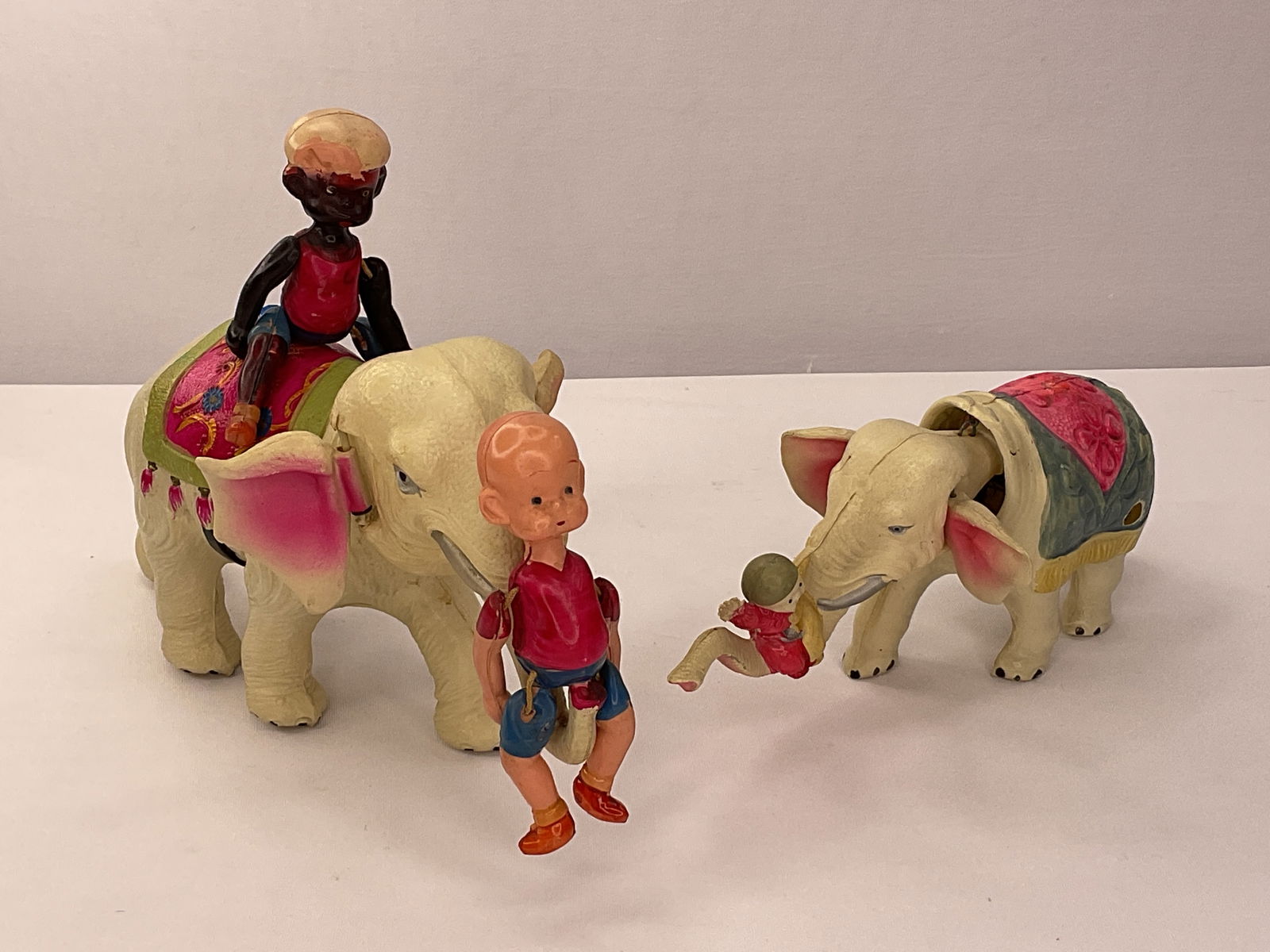 Celluloid Wind Up Circus Henry on White Elephant with Rider - Smaller Elephant with Rider on Trunk (1 of 11)