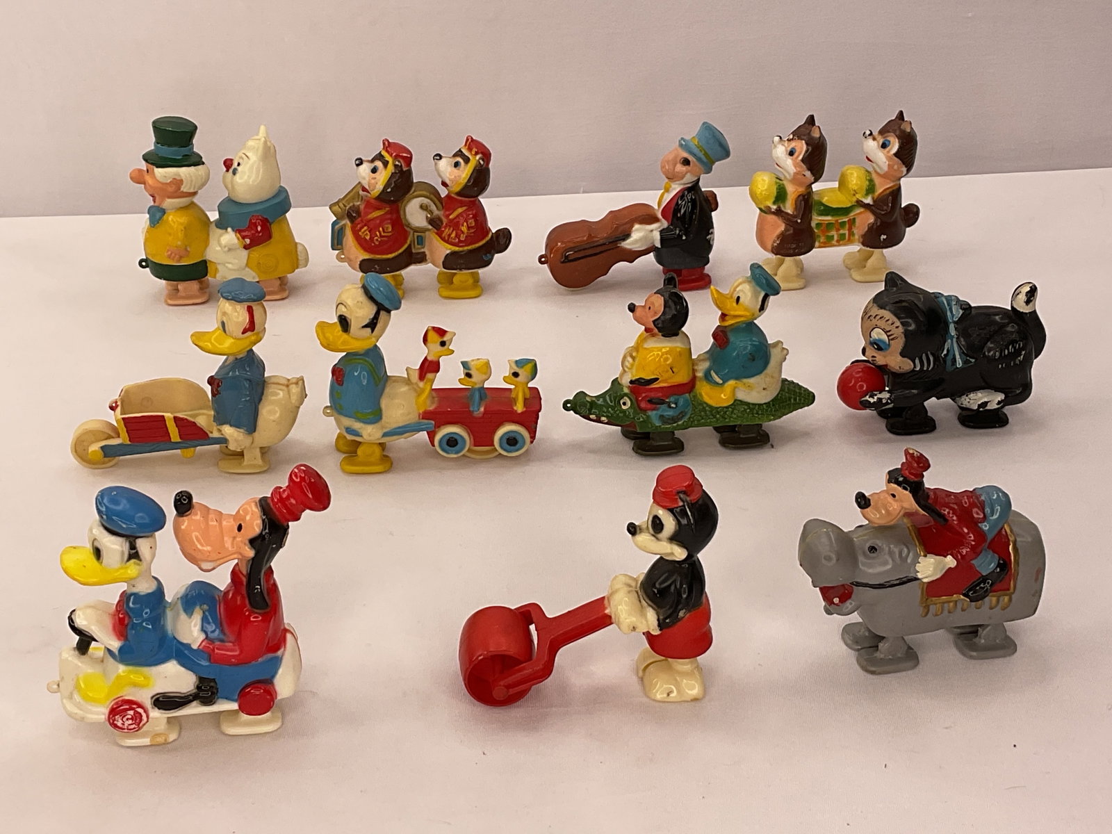 Group of (11) Disney Plastic Walkers: Group of (11) Disney Plastic Walkers