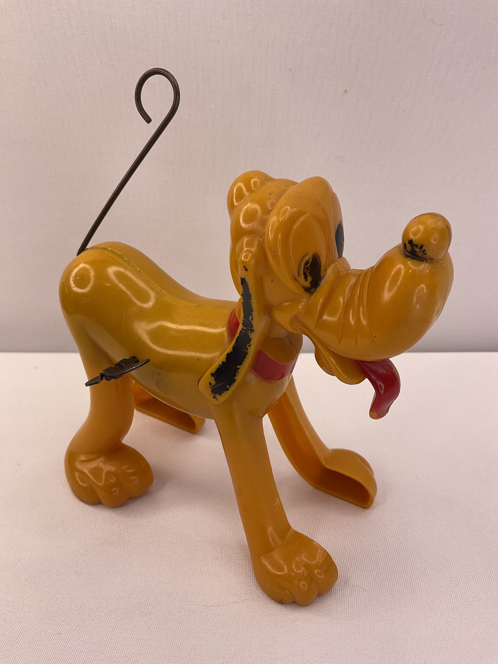 Walt Disney Productions Wind-up Plastic Pluto Tail Spins: Walt Disney Productions Wind-up Plastic Pluto Tail Spins