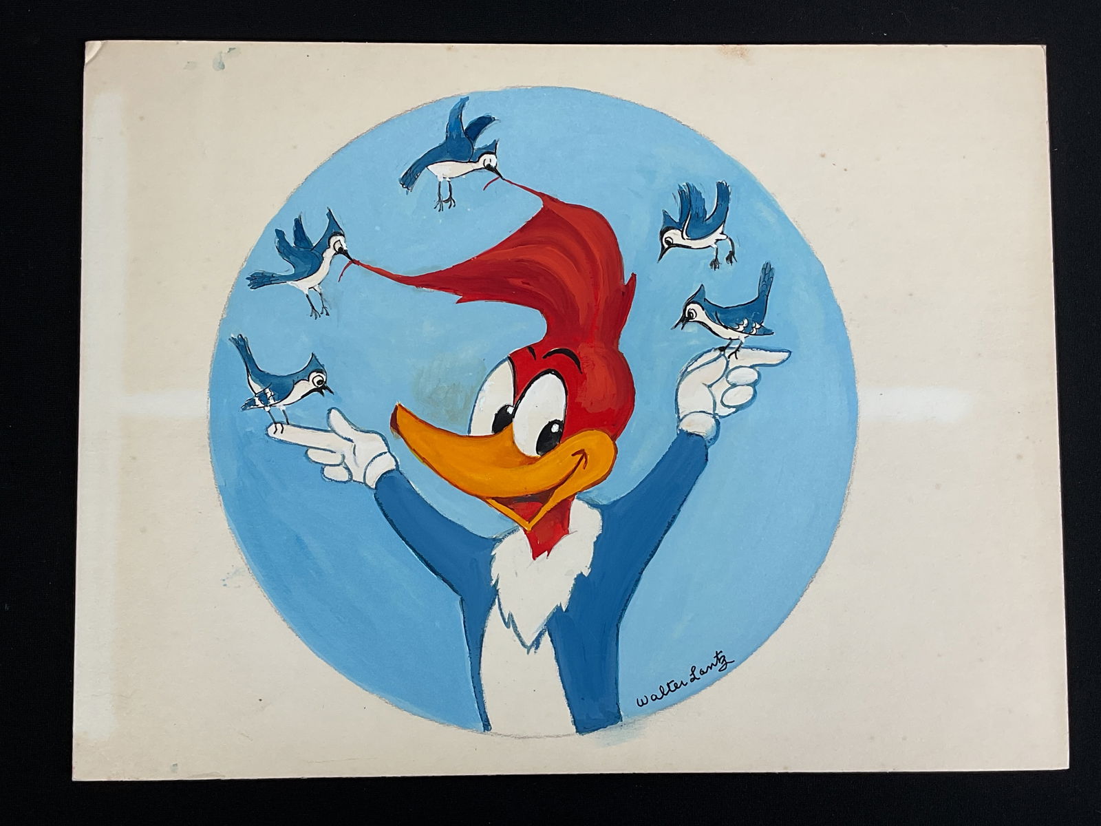 Original Oil Painting of WOODY WOODPECKER by Walter Lantz Signed: An original oil painting of Woody Woodpecker and blue birds by the creator of the character and signed by WALTER LANTZ. This was painted to appear on a limited edition plate..This came from the