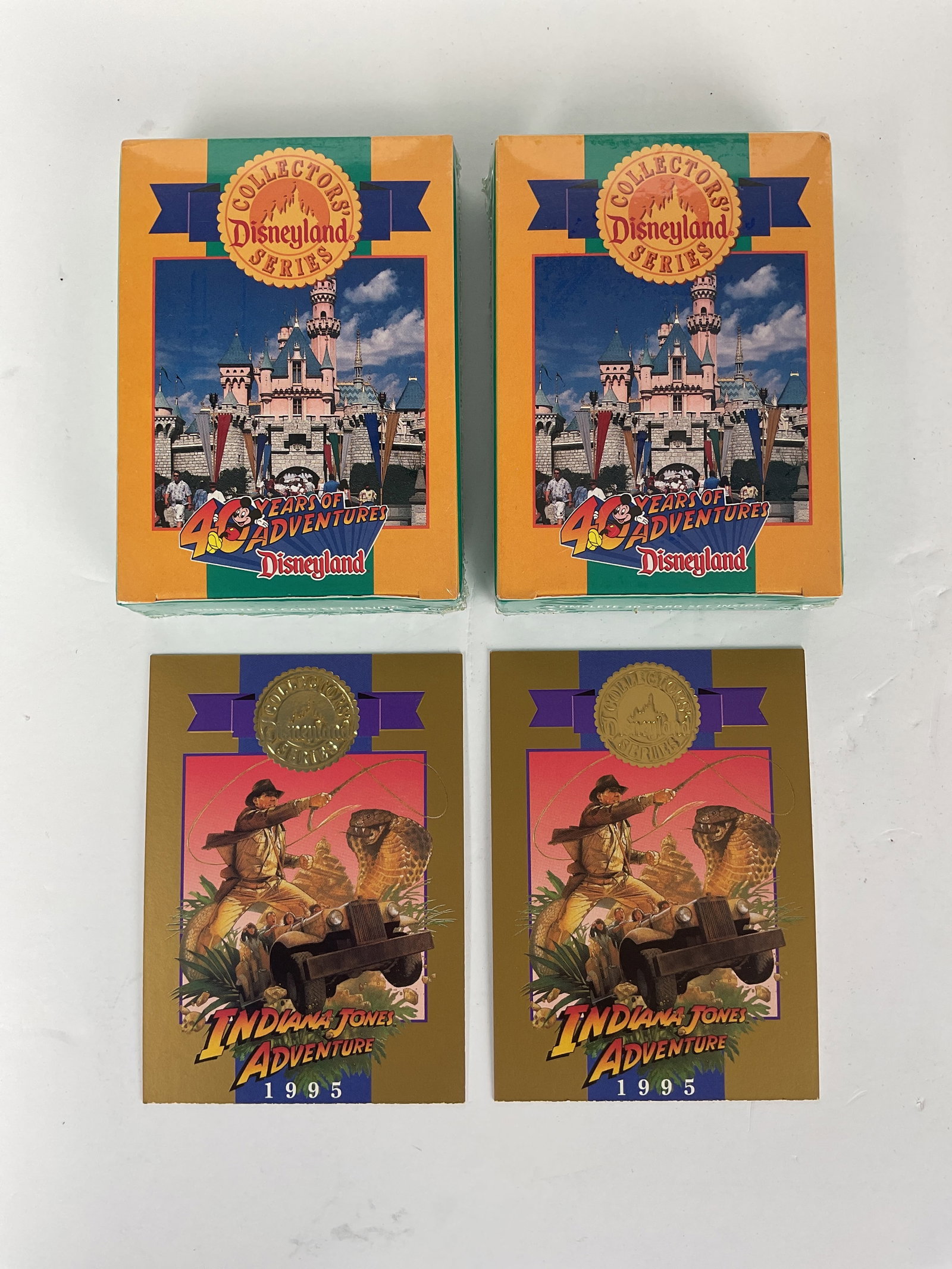 Collectors Series Disneyland Cards Series Trading Card SEALED 1995 2 Sets: Premiere Anniversary collection sequentially numbered limited edition. Lot includes 2 100% sealed 00126 & 00127 of 90000 as well as 2 matching Indiana Jones Adventure cards Temple of the Forbidden