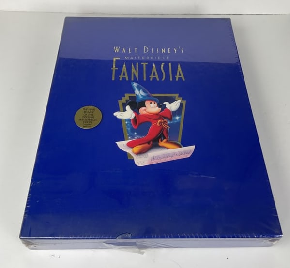 Masterpiece Fantasia Deluxe Collectors Edition SEALED small opening on bottom: Commemorative Edition 1991 sealed. The 50th anniversary commemorative VHS & DVD box completed with lithograph, COA, with picture book. Original retail price $99.99
