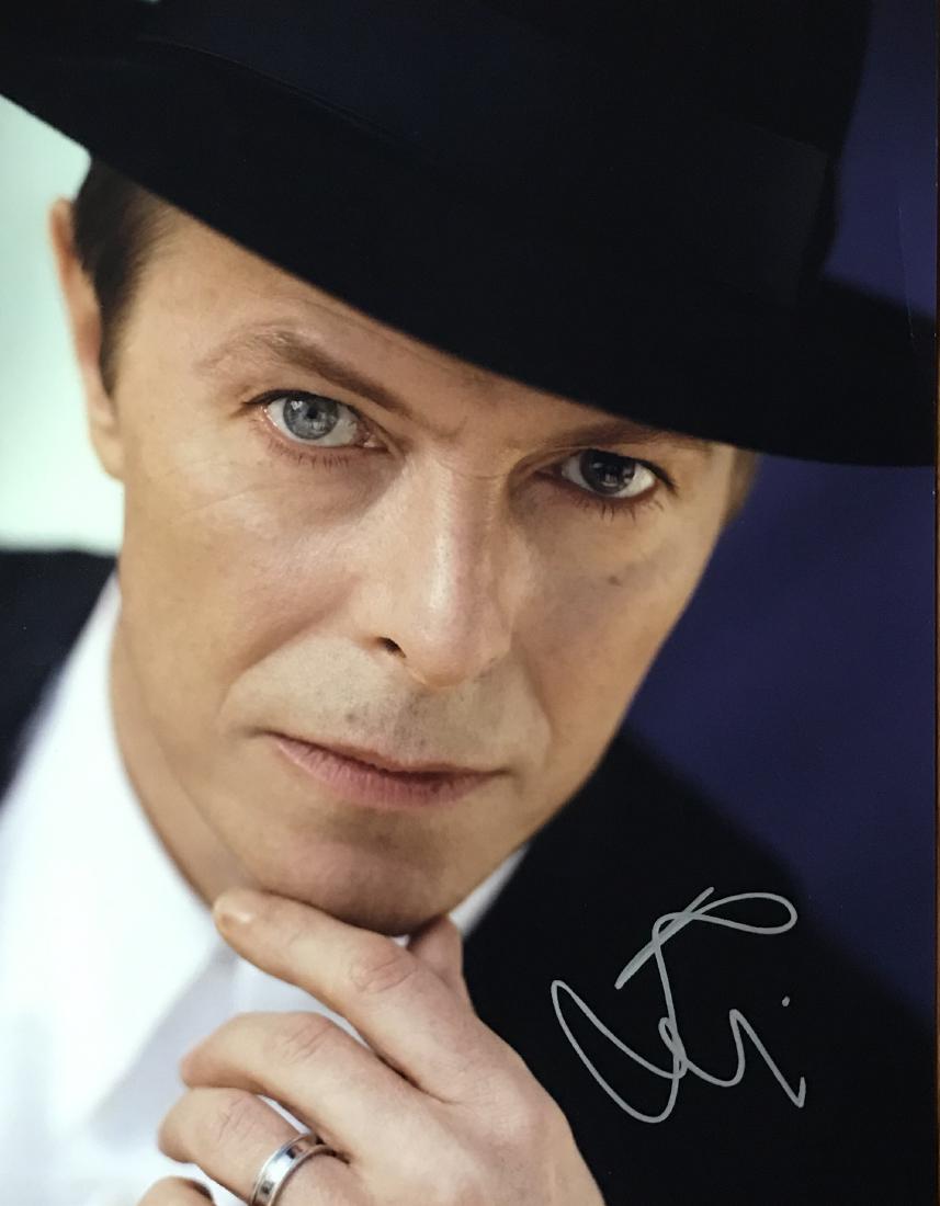 David Bowie 11x14 Signed Photo: Fantastic photo signed in person by this music legend. Amazing bold signature!