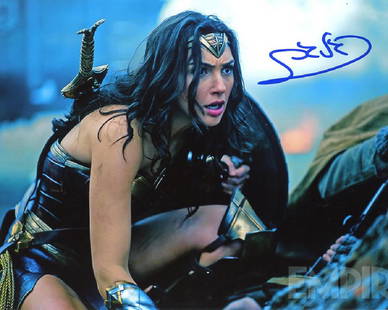 Gal Gadot WONDER WOMAN In Person Signed Photo: Gal Gadot in person signed autographed photo from the movie WONDER WOMAN. Gal Gadot as the character Diana Prince / Wonder Woman. Photo size is 8x10. Date & signing location provided. Comes with COA