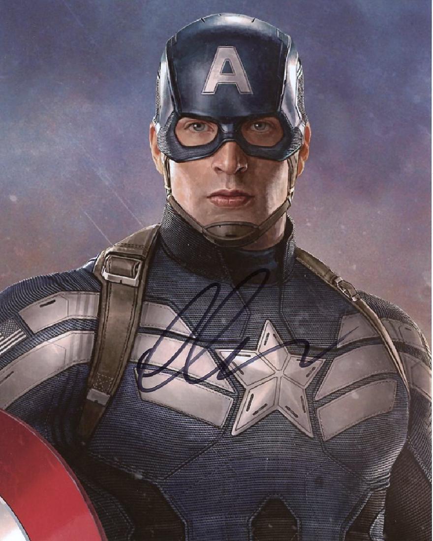 Chris Evans AVENGERS In Person Signed Photo: Chris Evans in person signed autographed photo from the movie THE AVENGERS. Chris Evans as the character Steve Rogers / Captain America. Photo size is 8 x 10