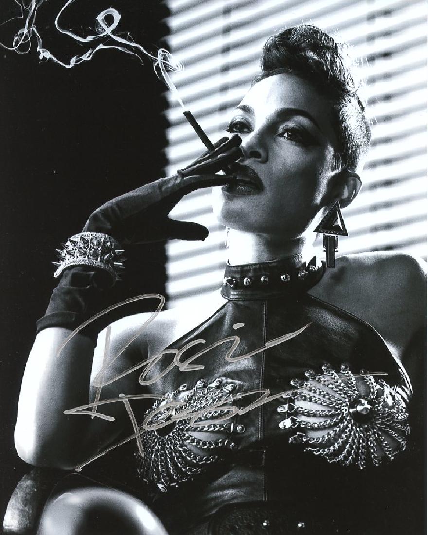 Rosario Dawson SIN CITY In Person Signed Photo: Rosario Dawson in person signed autographed photo from the movie SIN CITY. Rosario Dawson as the character Gail. Photo size is 8 x 10