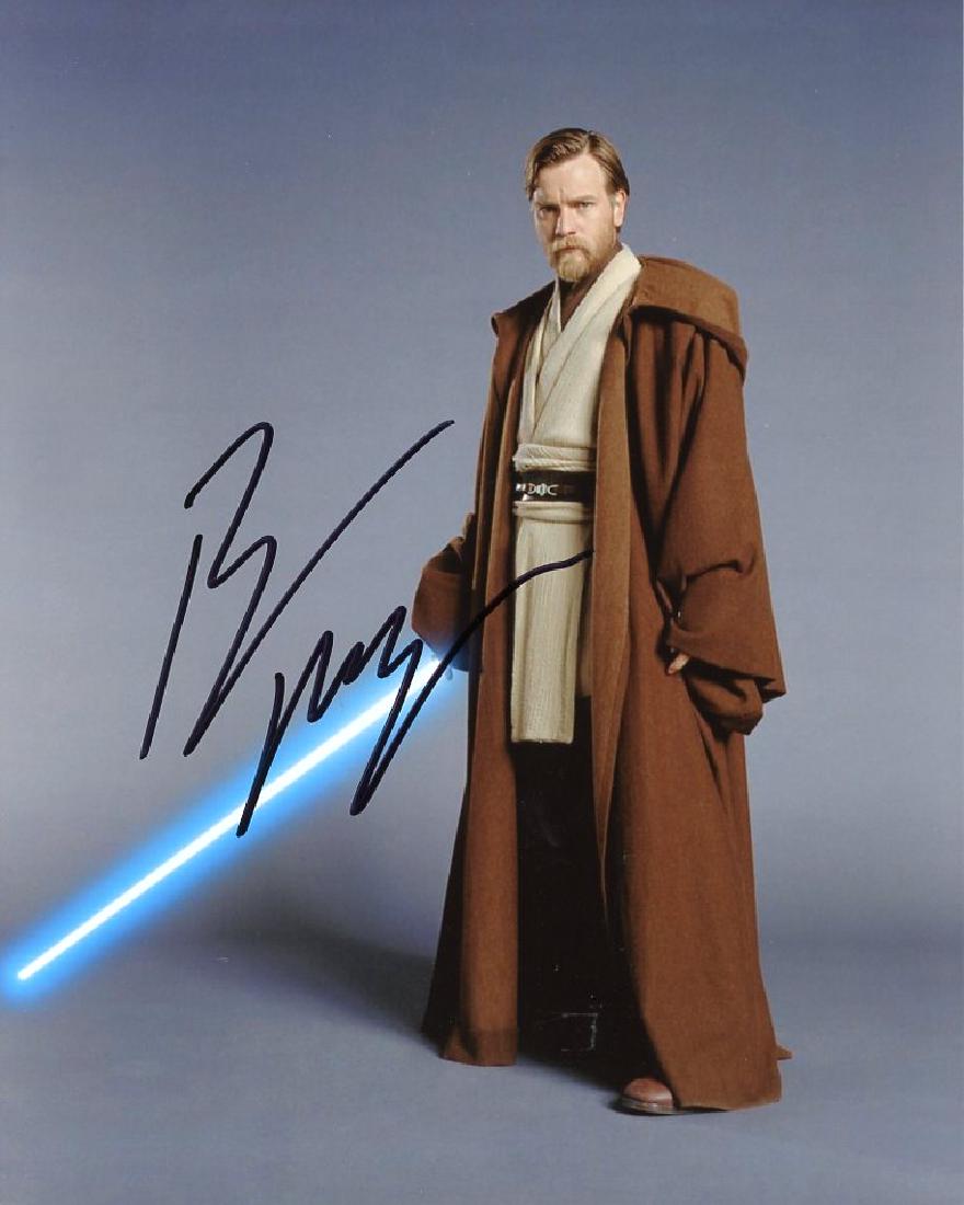 Ewan McGregor STAR WARS REVENGE OF THE SITH In Person: Ewan Mcgregor in person signed autographed photo from the movie STAR WARS REVENGE OF THE SITH. Ewan McGregor as the character Obi Wan Kenobi. Photo size is 8 x 10
