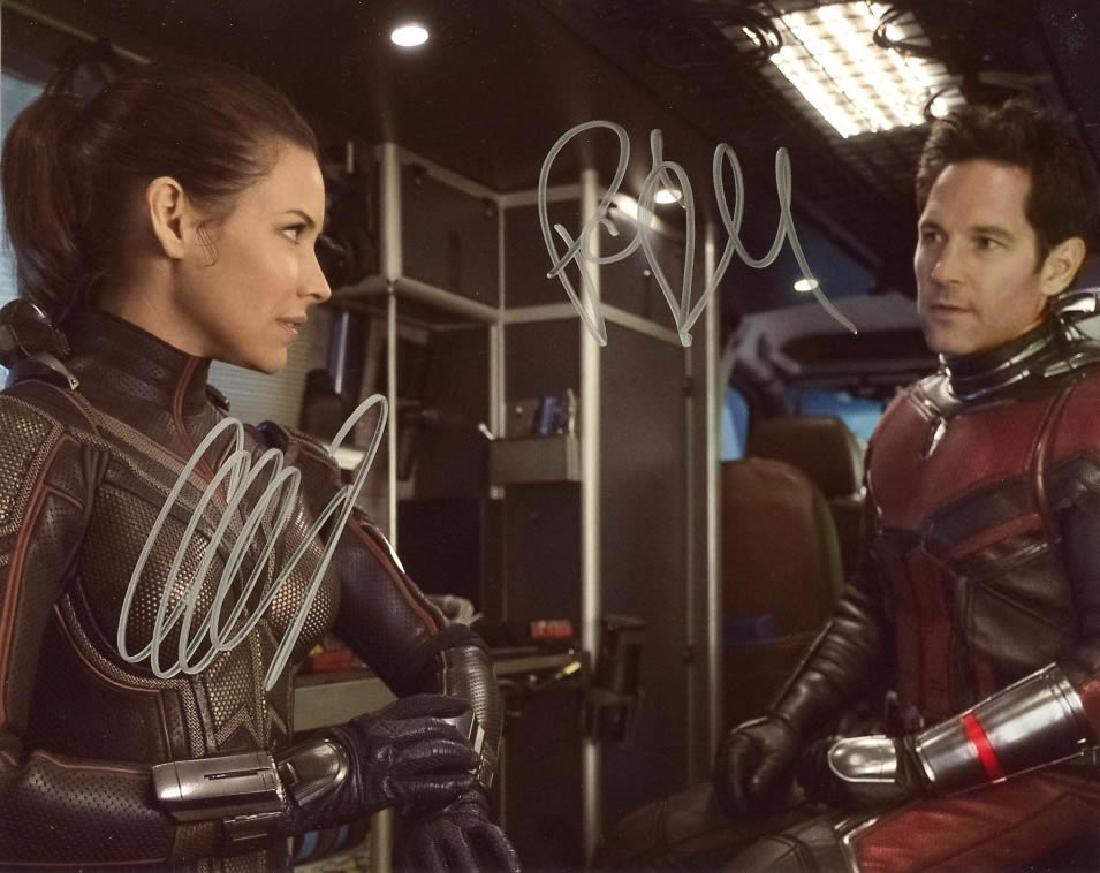 Paul Rudd / Evangeline Lilly ANT-MAN & THE WASP In: Paul Rudd / Evangeline Lilly in person signed autographed photo from the movie ANT-MAN AND THE WASP. Paul Rudd as the character Scott Lang. Evangeline Lilly as the character Hope Van Dyne