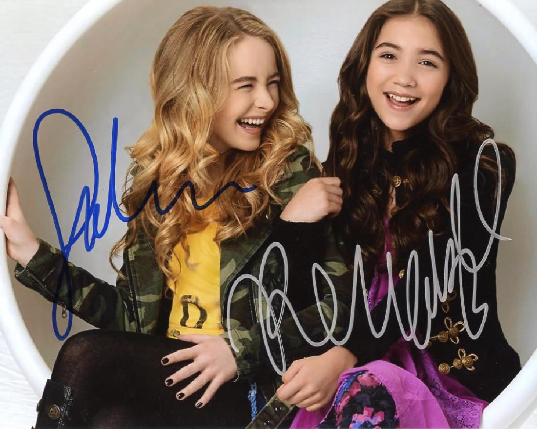 Sabrina Carpenter / Rowan Blanchard GIRL MEETS WORLD In: Sabrina Carpenter / Rowan Blanchard in person signed photo from the TV series GIRL MEETS WORLD. Sabrina Carpenter as the character Maya Hart. Rowan Blanchard as the character Riley Matthews. Photo siz