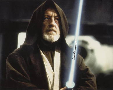 Alec Guinness STAR WARS Signed Photo #1: Alec Guinness signed photo from the movie STAR WARS. Alec Guinness as the character Ben Obi-Wan Kenobi. Fantastic photo!! Photo size is 8 x 10