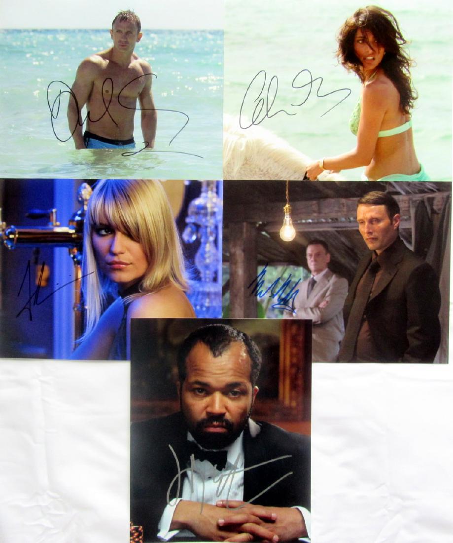 James Bond 007 CASINO ROYALE In Person Signed Photos: You are getting the 5 CASINO ROYALE in person signed photo shown here: Daniel Craig, Ivana Milicivic, Jeffrey Wright, Mads Mikkelson, and Catarina Murino. All photos are 8x10.