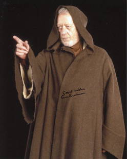 Alec Guinness STAR WARS Signed Photo #2: Alec Guinness signed photo from the movie STAR WARS. Alec Guinness as the character Ben Obi-Wan Kenobi. Fantastic photo!! Photo size is 8 x 10