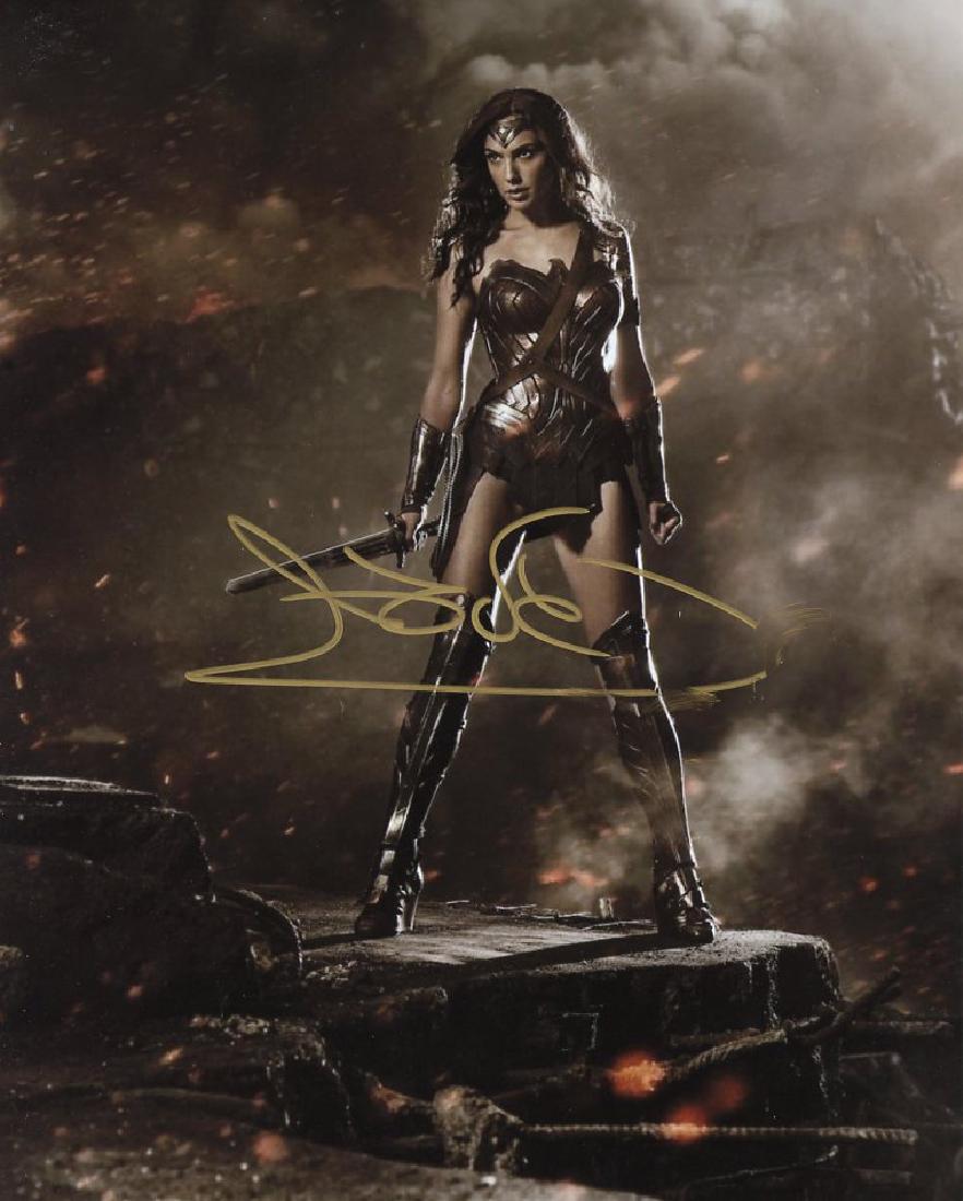 Gal Gadot BATMAN VS SUPERMAN In Person Signed Photo: Gal Gadot in person signed photo from the movie BATMAN VS SUPERMAN. Gal Gadot as the character WONDER WOMAN. Photo size is 8x10