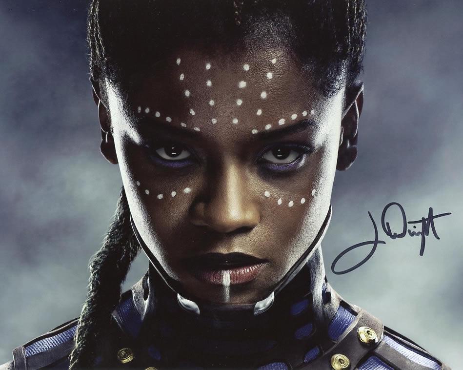 Letitia Wright BLACK PANTHER In Person Signed Photo: Letitia Wright in person signed autographed photo from the movie BLACK PANTHER. Chadwick Boseman as the character Shuri. Photo size is 8 x 10