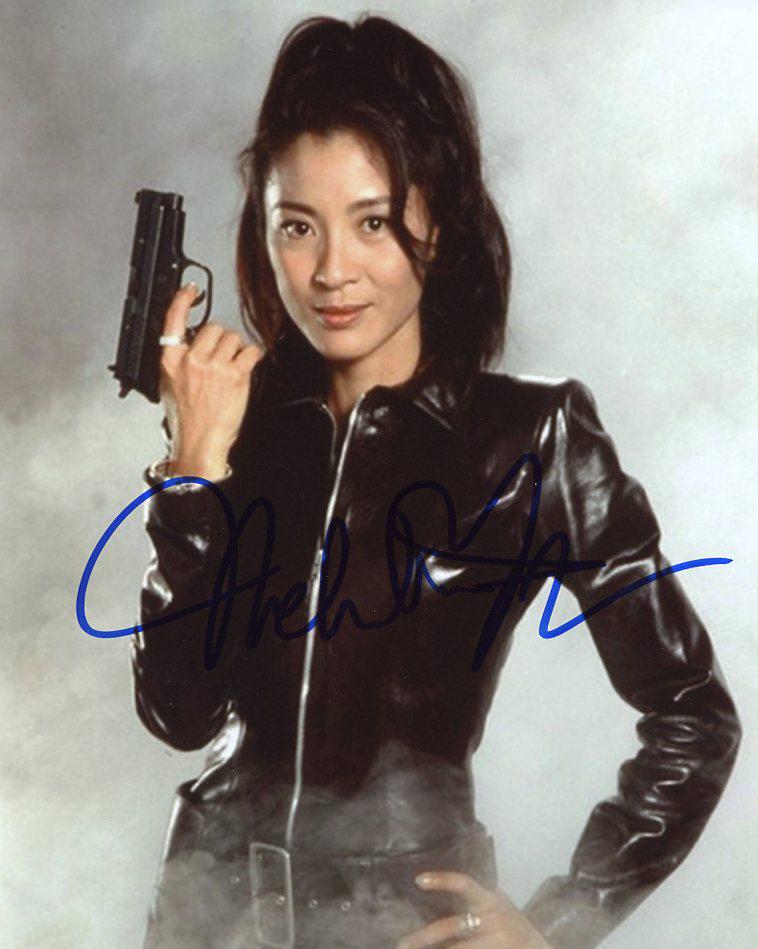 Michelle Yeoh TOMORROW NEVER DIES In Person Signed: Michelle Yeoh in person signed autographed photo from the James Bond movie TOMORROW NEVER DIES. Michelle Yeoh as the character Wai Lin