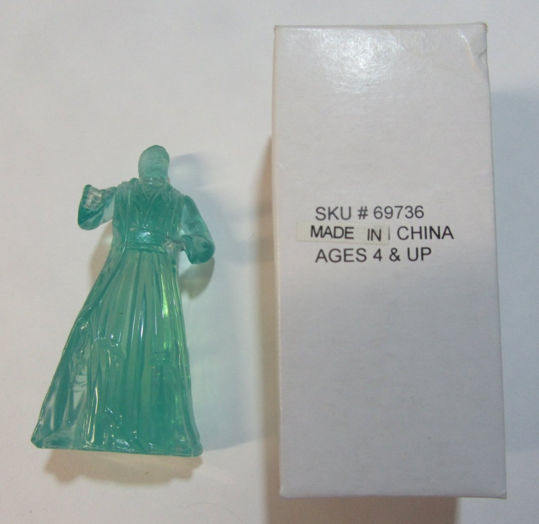 Ghost of Obi Wan-Kenobi Star Wars Mail In Figurine: Star Wars Ghost of Obi Wan-Kenobi. This was a mail in premium from the 1980's. IN new condition. Still in bag. Was only taken ou to photograph for this auction. Original box.
