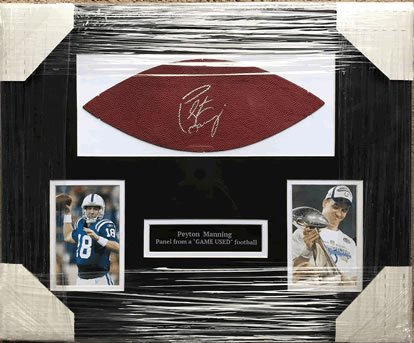 Peyton Manning Indianapolis Colts Signed Autographed: Peyton Manning signed autographed professionally framed and matted leather football panel. This hand signed Item comes with a certificate of authenticity: #01057. ED BEDRICK AUTOGRAPHS is pleased to l