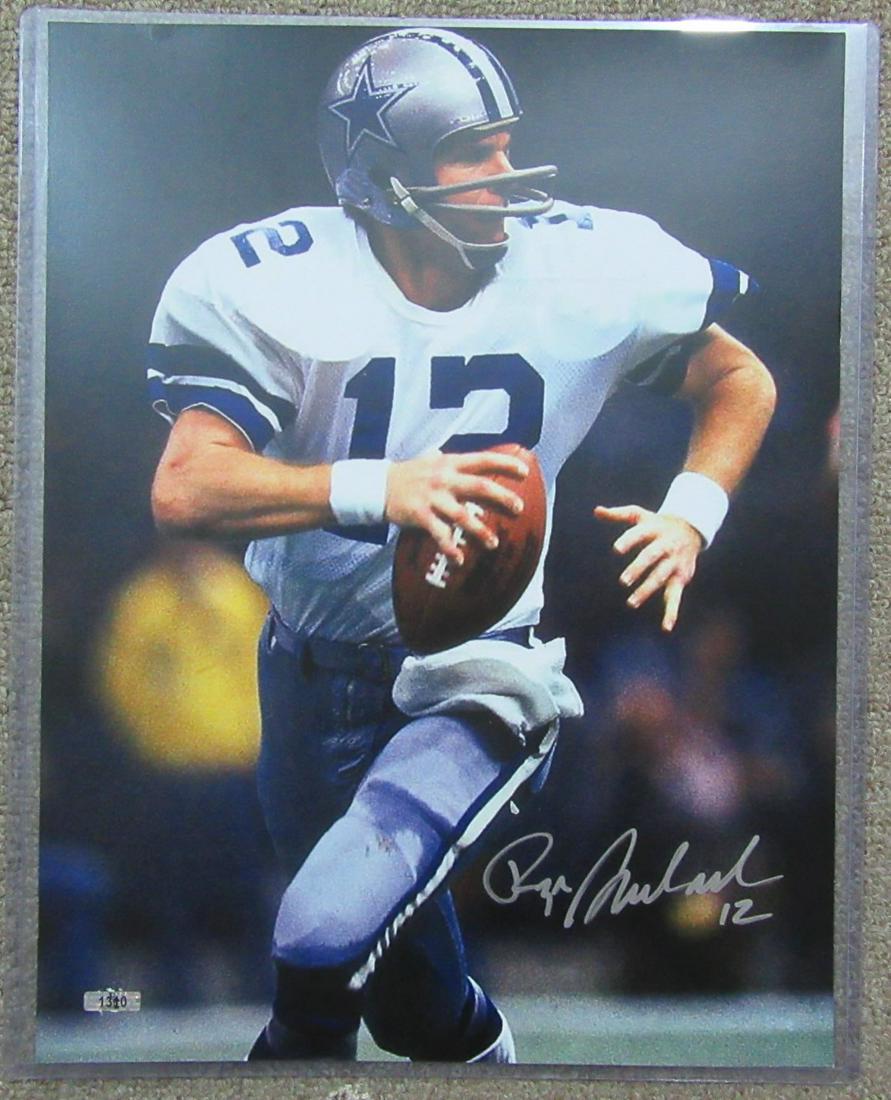 Roger Staubach Dallas Cowboys 11x14 Signed Photo: Roger Staubach Dallas Cowboys signed autographed 11x14 Photo. This hand signed Item comes with a Lifetime Certificate of Authenticity