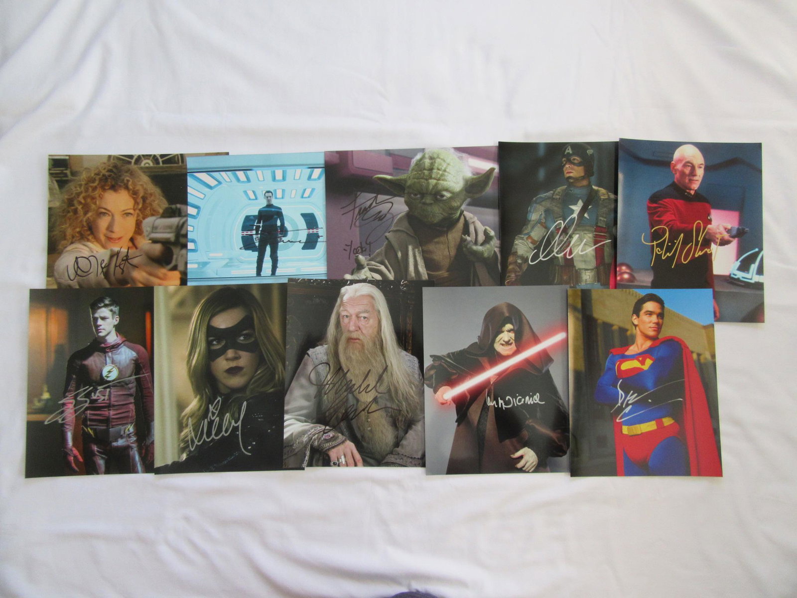 10 In Person Signed Photo Lot #9: You are getting all 10 photo shown here. Photos in this lot include: Alex Kingston, Benedict Cumberbatch, Frank Oz, Chris Evans, Patrick Stewert, Grant Gustin, Katie Cassidy, Michael Gambon, Ian McDia
