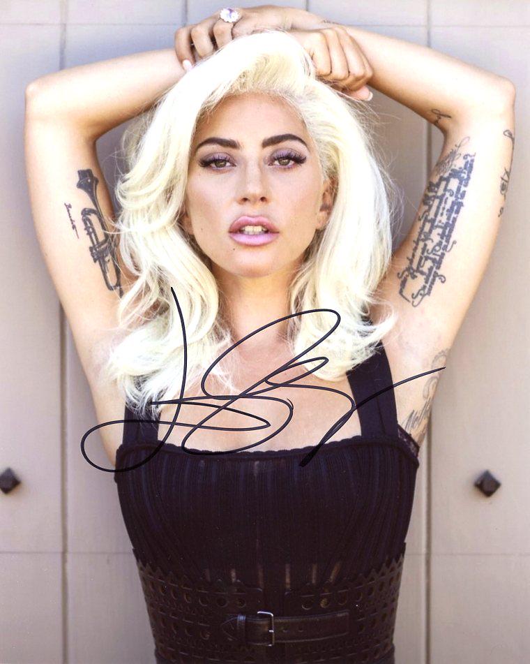 Lady Gaga In Person Signed Photo: Size of this photo is 8x10. Lady Gaga in person signed autographed photo. Besides being a pop icon superstar Lady Gaga has also been in movies such as A STAR IS BORN BORN, MACHETE KILLS, and SIN CITY