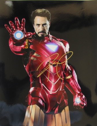 Robert Downey Jr 11x14 IRONMAN 2 In Person Signed Photo: Photo size is 11x14. Robert Downey Jr in person signed autographed photo from the movie IRONMAN 2. Robert Downey Jr as the character Tony Stark / Ironman