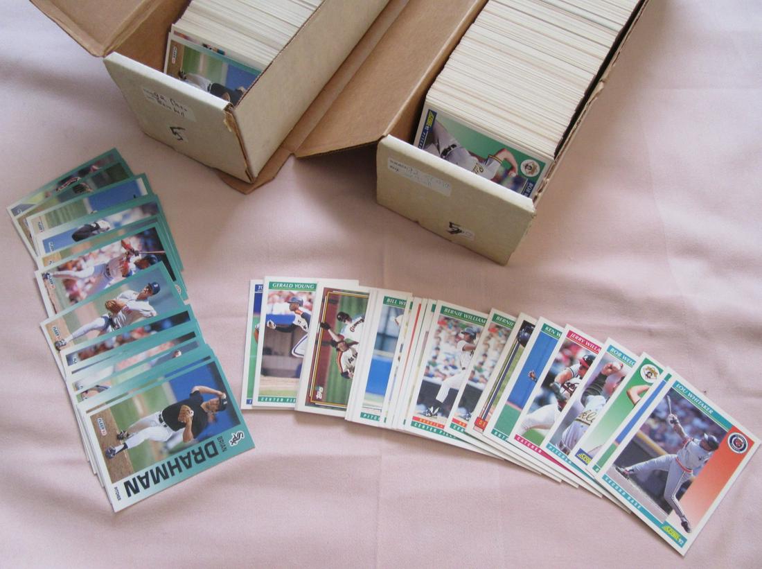 2 Boxes of (random) 1992 Baseball Cards: 2 baseball card boxes of opened random 1992 Baseball cards. I do not collect or deal in baseball cards so I know nothing about them or what might be in here. Found in a tote and selling as is.